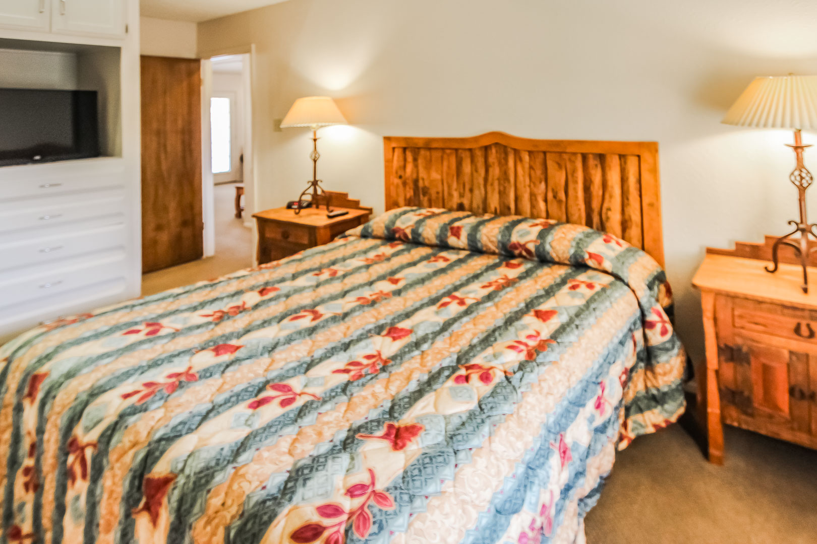 A spacious master bedroom at VRI's Vacation Village at Lake Travis in Texas.